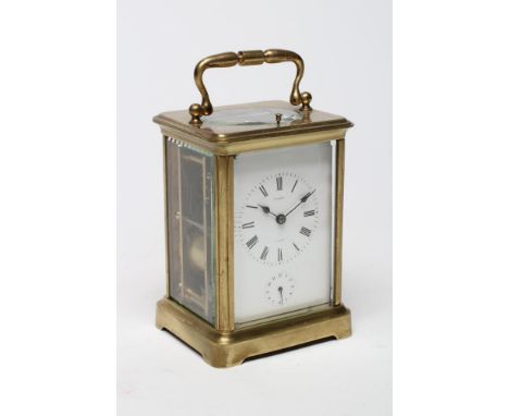 A BRASS CASED CARRIAGE CLOCK, early 20th century, the twin barrel movement with platform escapement and with repeat mechanism
