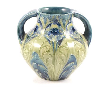 William Moorcroft for Liberty &amp; Co, a twin-handled vase, circa 1905, 'Florian Poppy' pattern, signed in green and with 'M