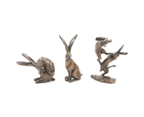 Paul Jenkins, three cast bronze models of Hares, including group of boxing hares, seated hare, and a preening hare, each sign