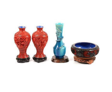 A pair of modern cinnabar resin vases with blue enamel interiors and base, 21cm; a 19cm diameter bowl with black resin overla