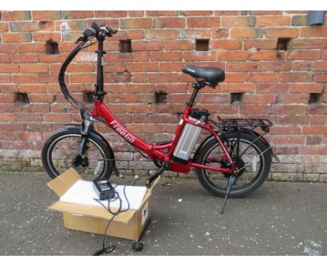 A 'Freego' 6 speed fold up electric bicycle with later 36v battery fitted, complete with charger