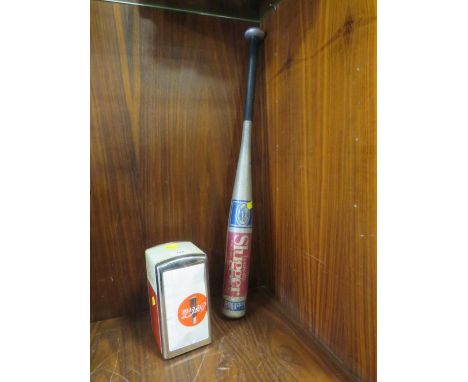 A vintage Coke Cola napkin dispenser together with a Louisville Slugger baseball bat (2)