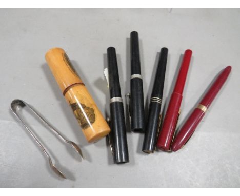 A small tray of collectables to include a Mauchlinware needle case, fountain pens etc