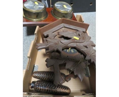 A twin weight cuckoo clock with dual barometer