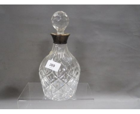 A hallmarked silver Collared Decanter