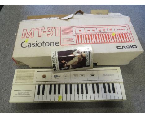 A boxed Casio MT/31 Casitone keyboard
