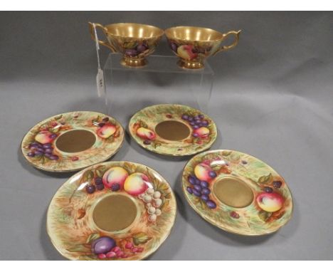 Two Aynsley Orchard Gold Trios with gilded interiors signed D Jones