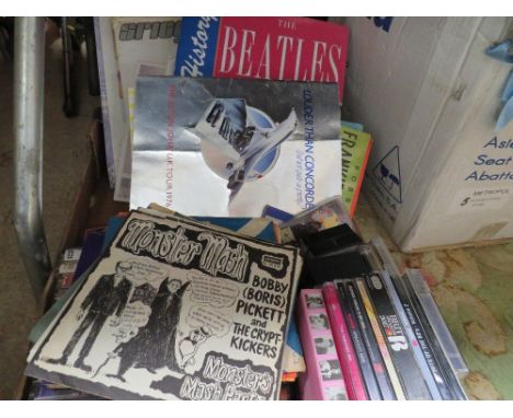 A selection of single records to include EPs, together with a collection of books, cassette tapes, sheet music etc.