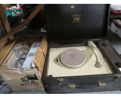 A vintage HMV record player together with a vintage projector