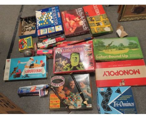 A large box of assorted vintage games to include chess set, recorders, Casio VL-Tone, blockbusters etc