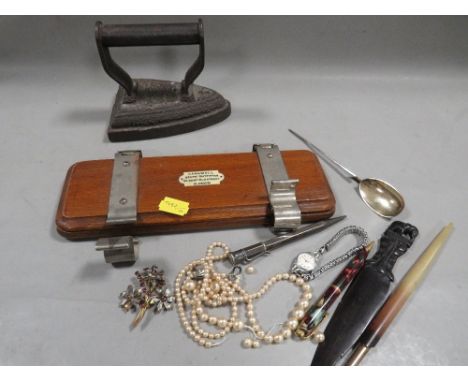 A group of collectables to include boxed replica Roman spoon (Hallmarked silver), pens, pencils, flat iron tie press etc.