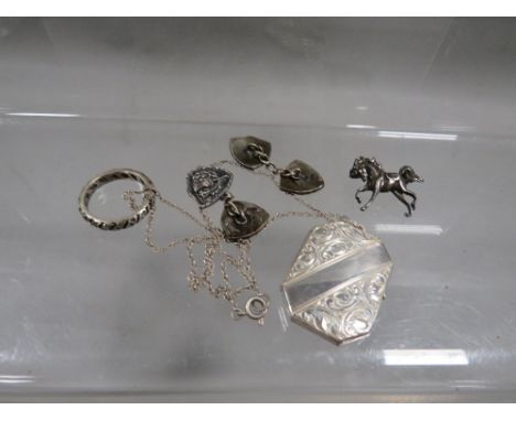 A silver locket, cufflinks etc