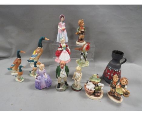 A tray of assorted figurines to include Royal Worcester, Beswick and Doulton - some with damages