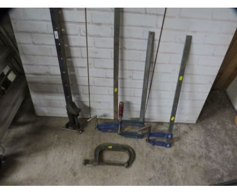 A selection of 4 sash cramps and 1 G cramp