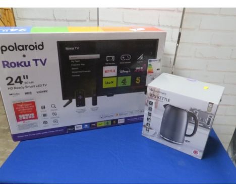 A Polaroid 24" boxed smart TV together with a boxed kettle