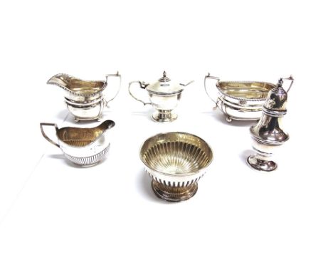 A SILVER GEORGIAN STYLE SUGAR BASIN  with matching cream jug; a small silver bowl; a small silver cream jug, a silver baluste