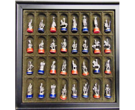 A BATTLE OF WATERLOO CHESS SET  the cast metal figural 'kings' 5.5cm high overall inclusive of bases, in a fitted box with a 