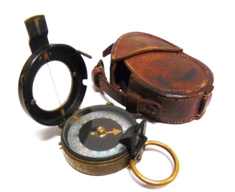 A GREAT WAR BRITISH PRISMATIC MARCHING COMPASS  Verner's Pattern VIII, serial number 93084, dated 1917, in a leather case sta