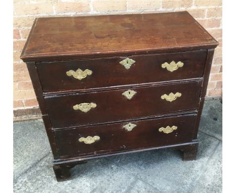 A THREE DRAWER OAK CHEST  on bracket feet, 90cm wide 49cm deep 84cm high