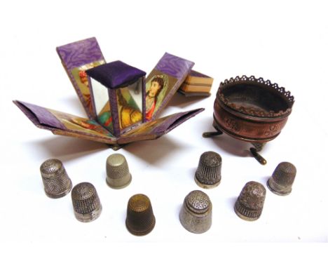 A STRAW-WORK PEDESTAL COMBINATION NEEDLE CASE AND PIN CUSHION  with a hinged lid, fall-flap sides each decorated with a colou