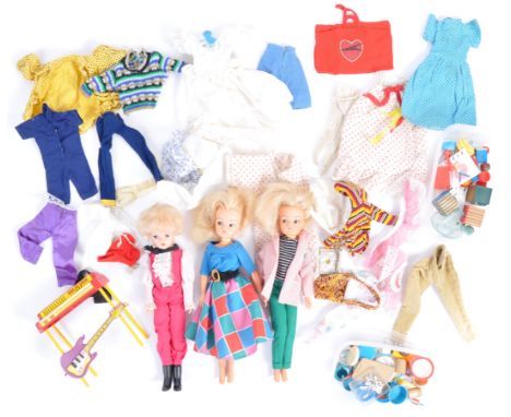 A good collection of assorted vintage Pedigree made Sindy dolls, outfits and accessories. Includes; x3 vintage Sindy figures 