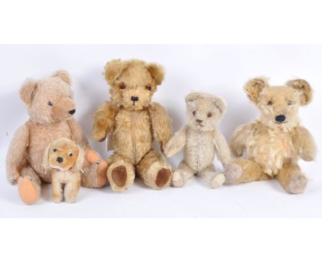 A good collection of x5 antique / vintage teddy bears, comprising;- a 1950's Steiff small stuffed dog teddy bear with black a