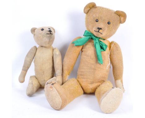 Two antique c1910 believed Steiff / German made teddy bears. The first being a small mohair teddy bear with boot button eyes,