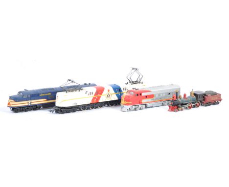 A collection of x4 H0 / 00 gauge model railway trainset locomotives - all American ' Railroad ' type locos, and all unboxed. 