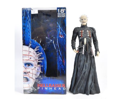 A rare Neca Reel Toys Hellraiser ' Pinhead ' Horror large scale 18" action figure. Appears mint and complete within the origi