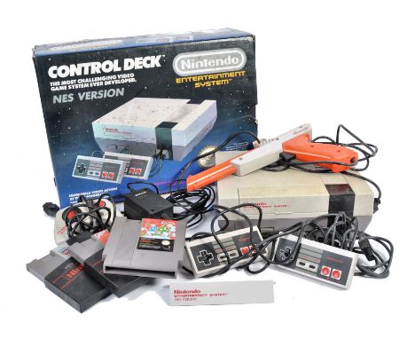 An original vintage Nintendo made NES ' Nintendo Entertainment System ' video games computer console comprising of a boxed co