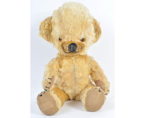 A charming vintage mid-20th century c1950's Merrythought made ' Cheeky ' teddy bear. Blonde mohair, with bells inside head, o