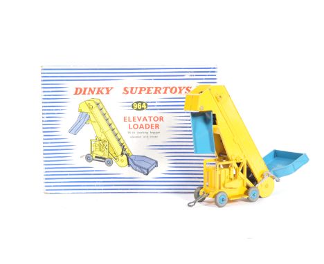 An original vintage Dinky toys made diecast model 964 Elevator Loader with working hopper elevator and chute. Yellow and blue