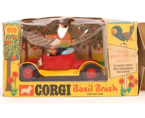 An original Corgi Comics made TV related diecast model No. 808 ' Basil Brush and his car '. Model is good within original box