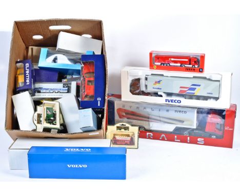 A collection of 25+ assorted boxed diecast models - largely Iveco / Haulage related, but some others present. Collection incl