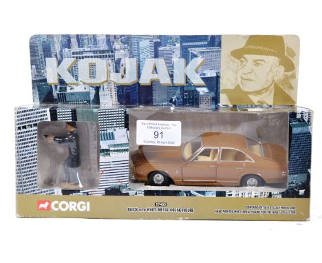 An original Corgi made TV related scale diecast model 57403 Kojak Buick with white metal figure. Appears mint within original