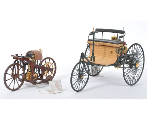 Two original Franklin Mint precision scale diecast models comprising a 1/8 scale 1885 Daimler single track motorcycle and an 