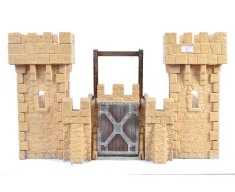 A large original Schleich made German large scale toy model soldier fort / castle comprising of a large drawbridge with worki