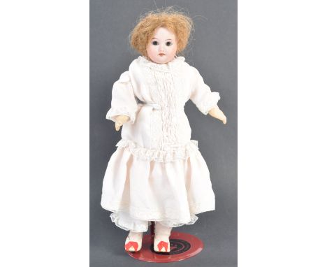 An antique late 19th / early 20th century French bisque headed doll. Makers marks to rear of head (faint) believed to be for 