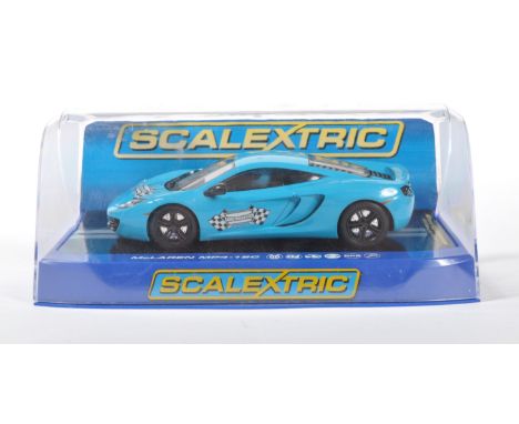 A rare original Scalextric made 1/32 scale slot racing car 2012 Retailer Range Presentation C3328 McLaren MP4-12C. Appears mi