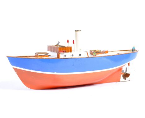 A beautifully made radio controlled live steam model of a boat. Fitted with a believed Cheddar twin-piston engine, boiler and