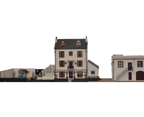 An incredible three-metre long Victorian Manor House, Garden & Stable dolls house diorama. The diorama comprising of several 