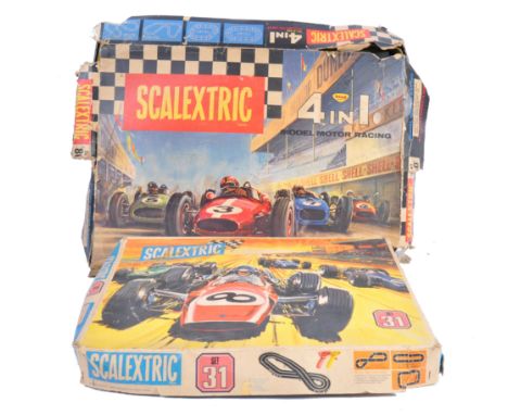 Two original vintage Scalextric made 1/32 scale slot racing car sets comprising a 4 in 1 set with four cars and a set No. 31.