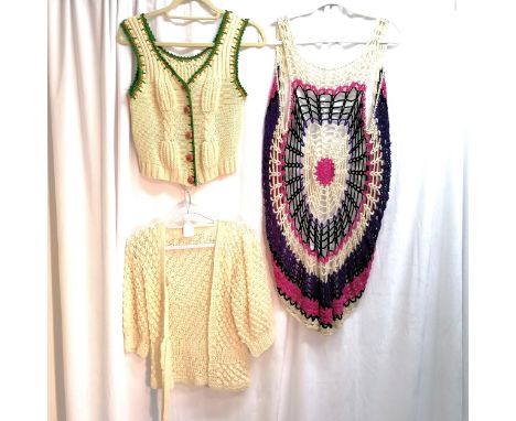 3 1970's knitted. 1 hand knitted cardigan, cream waistcoat with green and yellow rim with unusual painted yellow button and c