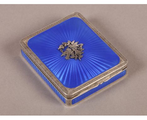 A .935 STANDARD CONTINENTAL SILVER AND ENAMEL BOX OR COMPACT, the hinged lid with bright blue radiating enamel panel set to t