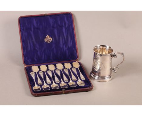 A VICTORIAN SET OF TWELVE EPNS ICE CREAM SPOON, with gilded bowls and foliate cast handle with wreath cartouche terminal engr
