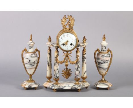 A MID 19TH CENTURY FRENCH MARBLE AND ORMOLU CLOCK garniture, the drum shaped case with bow, arrow and laurel finial, white en