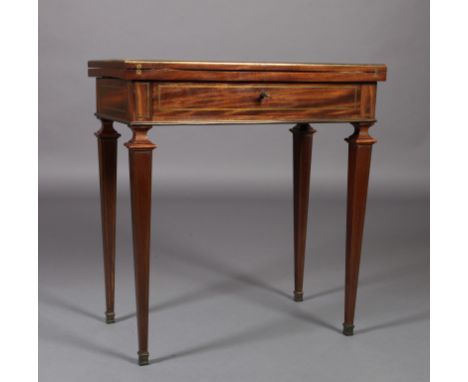 A FRENCH EMPIRE MAHOGANY COMBINATION WRITING TABLE  card table, the top finely inlaid in cut brass with a vacant cartouche wi