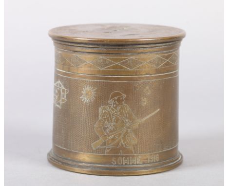 TRENCH ART A WWI BRASS SHELL CARTRIDGE engraved with the three quarter portrait of infantryman, pilot and bi-planes, shrapnel