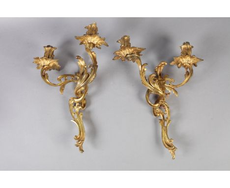 A PAIR OF GILT METAL TWIN LIGHT ENTWINED FOLIATE WALL SCONCES, 41cm high 