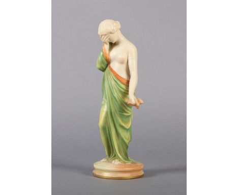 A ROYAL WORCESTER FIGURE OF SORROW, c.1890 in blush ivory and green with gilt highlights, printed mark, no 257, 25cm high 